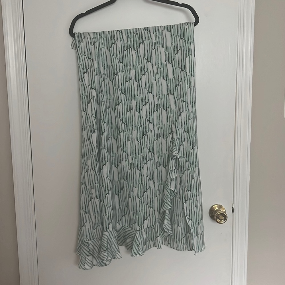 Top shop white, mint, and black skirt. Ruffle and slit.